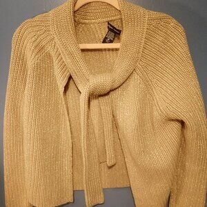 New York and company gold sweater.